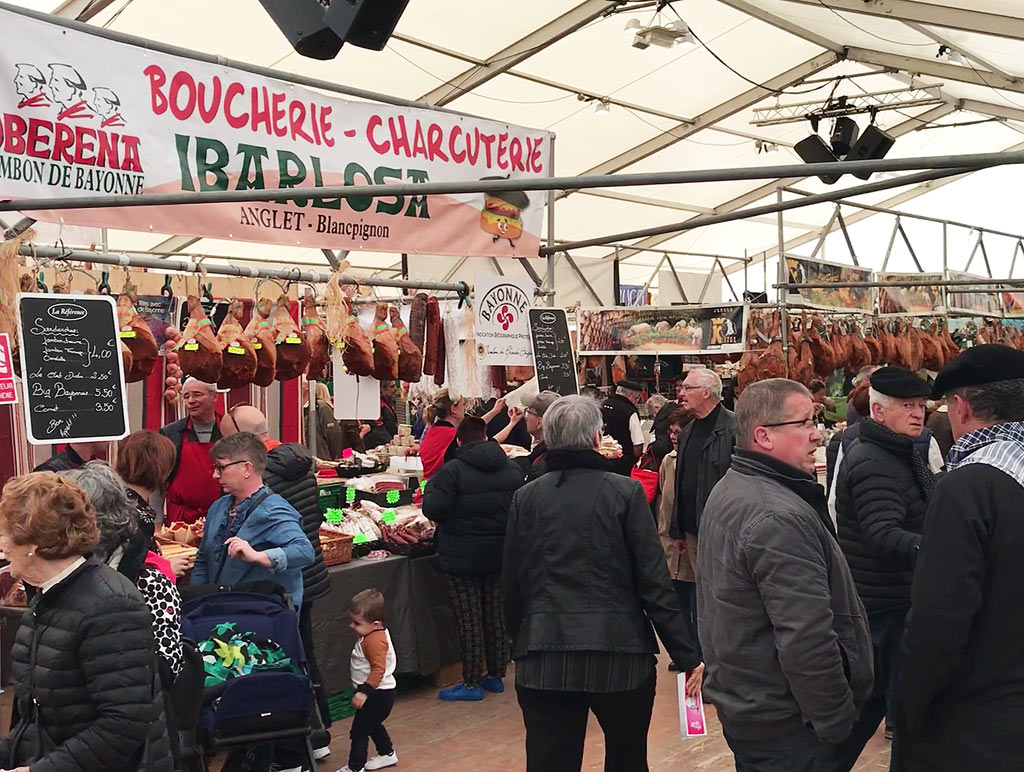 Under the meat-curing tent